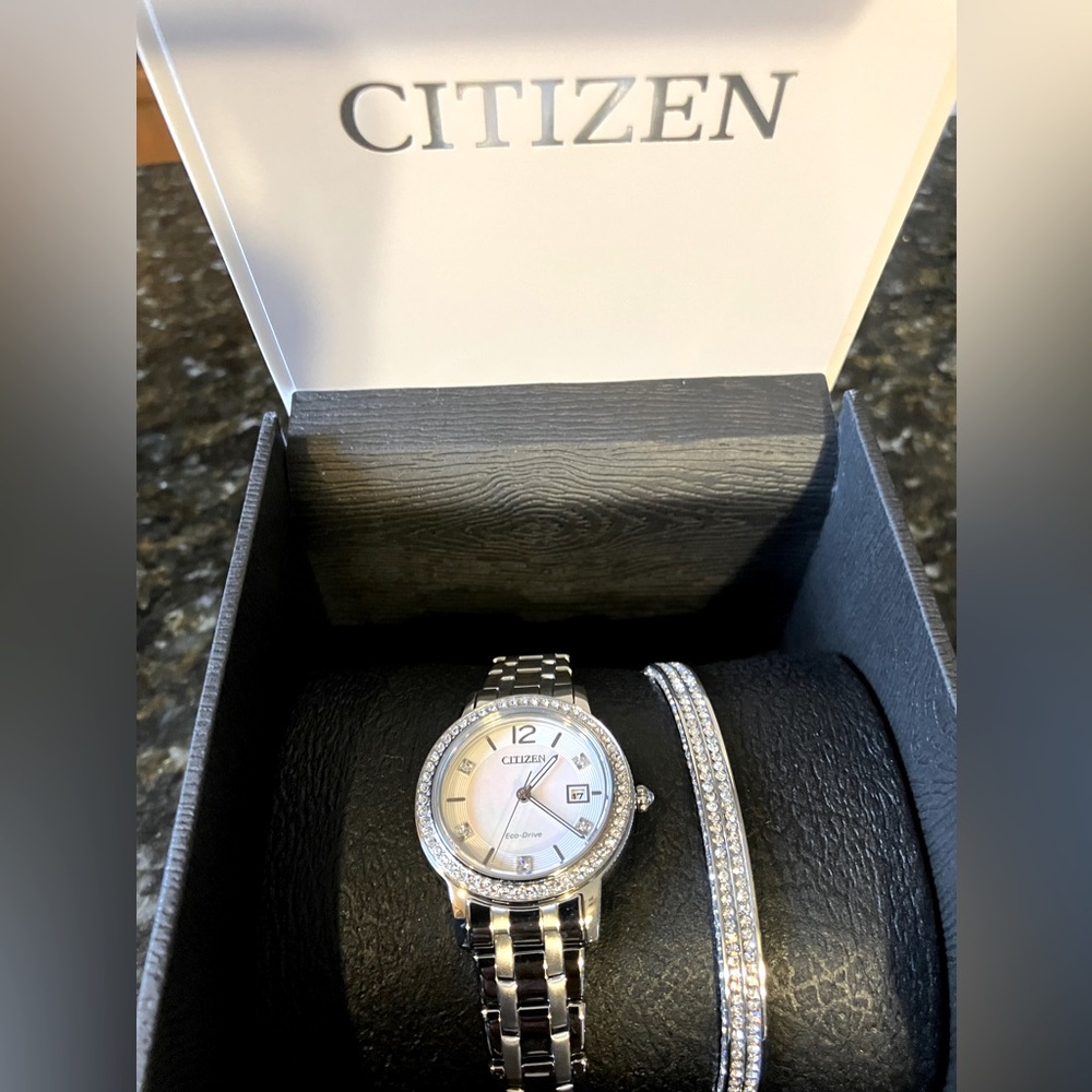 Women’s {BRAND NEW} Citizen stainless steel watch and bracelet set.